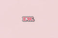 Pin - ”EW.”