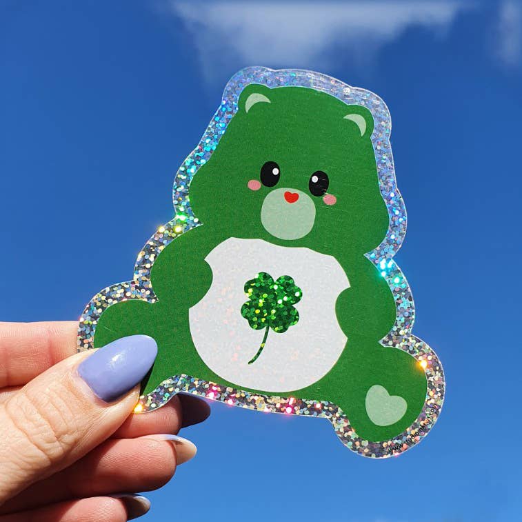 Glittrig klistermärke Care Bear med fyrklöver