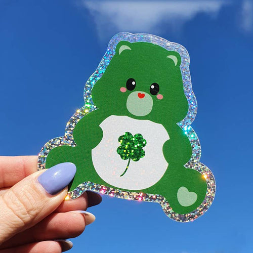 Glittrig klistermärke Care Bear med fyrklöver